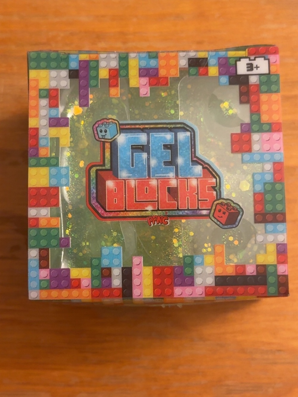 Green Gel Blocks Toy with Colorful Brick Design. Squishy blocks that can stack!